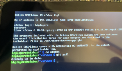 Monitor showing terminal and git pull